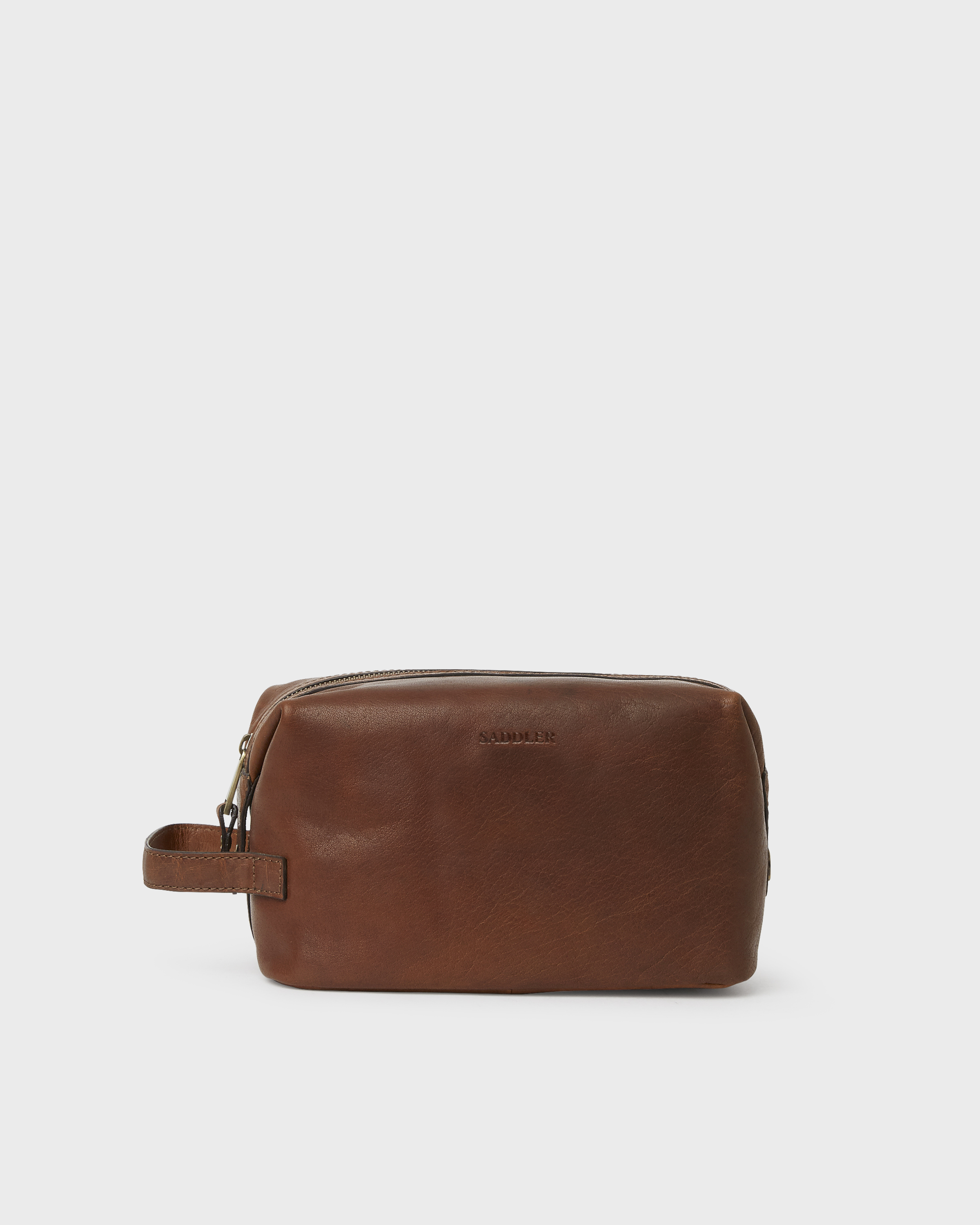 brown toiletry bag