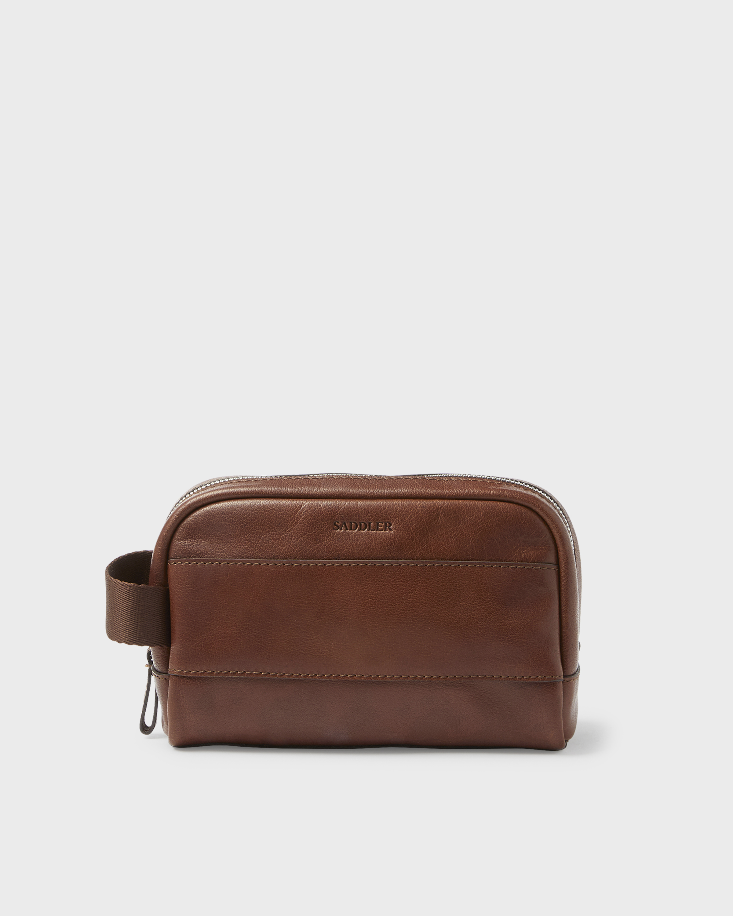 brown toiletry bag